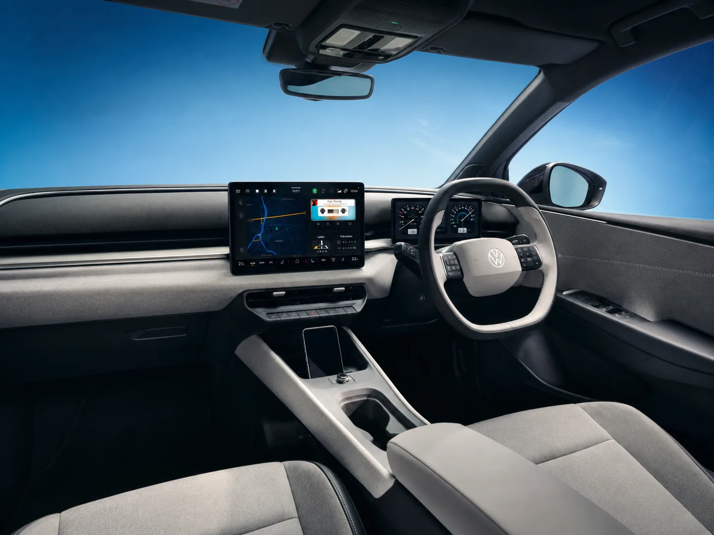 Interior of the Volkswagen ID. Polo showing the central touchscreen, driver display and physical controls